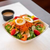 Asian Cobb Salad · Romaine lettuce, red pepper, cabbage, pickled radish, soy-marinated boiled egg, bamboo shoot...