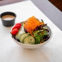 Side Salad · Spring mix, cherry tomatoes, English cucumber, red onion, and carrot
