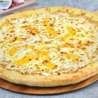 White Pizza · Our fresh dough is basted with a touch of oil and garlic, topped with an extra amount of our...