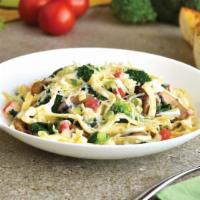 Veggie Fettuccine Alfredo · Creamy Alfredo sauce, sauteed broccoli, fresh mushrooms, spinach, tomatoes, Parmesan cheese,...