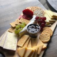 Fruit and Cheese Board · French brie, smoked gouda, six month aged manchego, havarti dill, strawberries, grapes, fig ...
