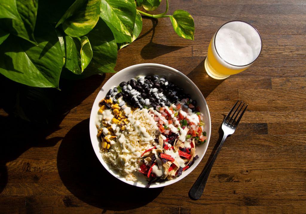 Santa Fe Bowl · Served warm with basmati rice or cold with crisp romaine. Sweet, fire-roasted corn, pico, black beans, Jack cheese, tortilla strips and avocado ranch dressing. Add vegan beyond meat or chicken for an additional charge.