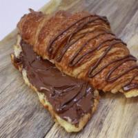 Italian Croissant · Freshly baked croissant filled with Nutella spread.