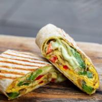 Egg Wrap · Thin flour tortilla stuffed with 2 scrambled eggs, sauteed onions, peppers and avocado sauce. 
