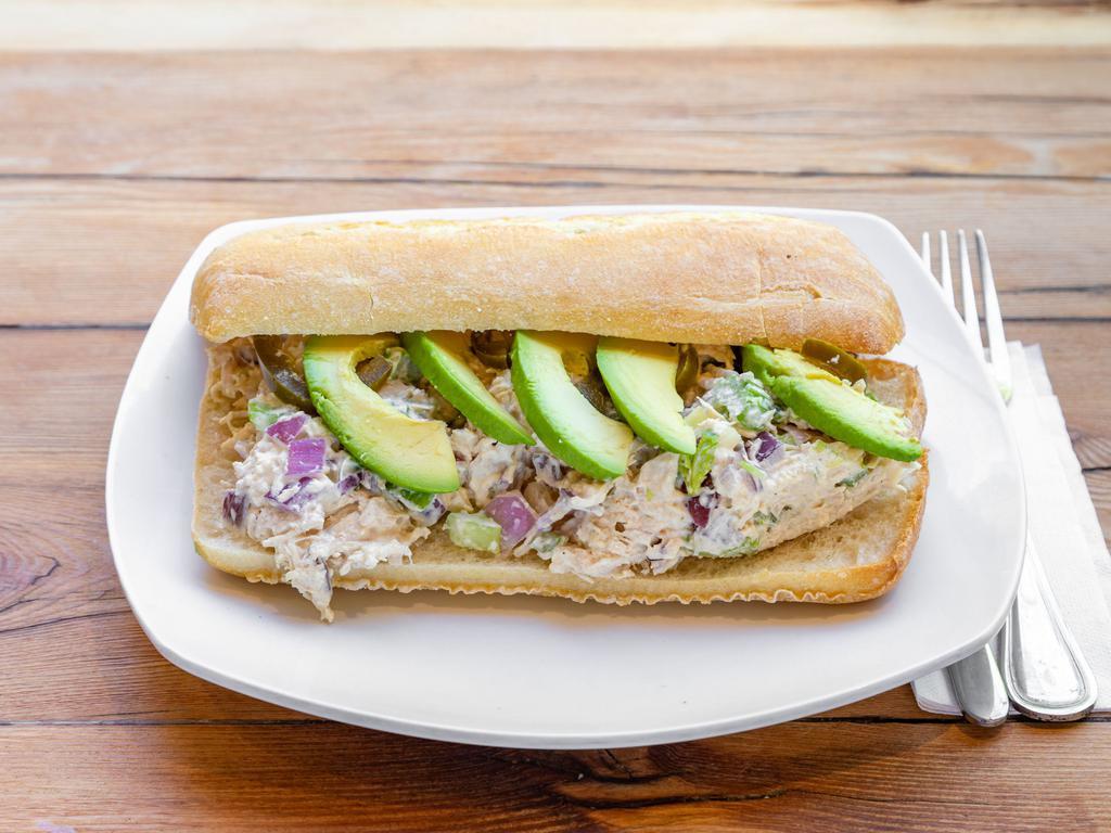 Roasted Mustard Chicken Sandwich · Roasted chicken mixed with diced onions, crunchy celery, and mustard mayo on ciabatta bread