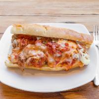 Meatball Parm Sandwich · Meatballs in tomato sauce with parmesan and mozzarella cheeses served in  french baguette.