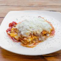 Meat Lasagna · Classic Italian lasagna with bolognese sauce, topped with shredded mozzarella.