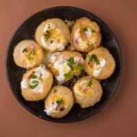  Dahi Puri  · Crispy puri stuffed with boiled potatoes mix, tangy chutney with sweet yogurt and sev on top...