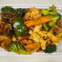 150. Four Seasons · Jumbo shrimp, pork, chicken, beef with mixed Chinese vegetables. Served with rice.