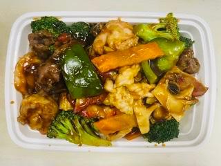 150. Four Seasons · Jumbo shrimp, pork, chicken, beef with mixed Chinese vegetables. Served with rice.