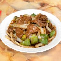 102. Pepper Steak with Onion · Served with white rice.