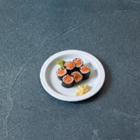 Spicy Salmon Roll · Inside out roll.
