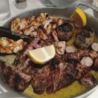 Grilled Meat Combination · Beeftekia, ribeye steak, chicken breast and sausage.