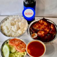 Family Combo #1 · One whole rotisserie chicken, large rice, medium beans, salad and 1-liter soda.