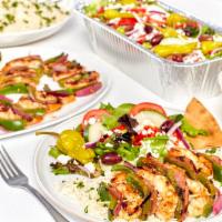 Shrimp Kebobs Family Feast · Grilled Shrimp Kebobs (2 per serving) with green peppers and onions, served with a Greek Sal...