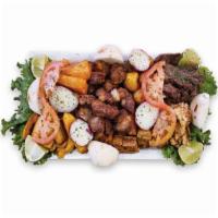 La Picadera  · Colombian sausage, pork skin, grilled meat, pork ribs, fried green plantain, casava, corn ca...