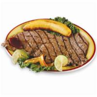 Carne Asada · Grilled steak. It comes with sweet plantains, salad, rice, beans or French fries
