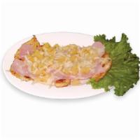 Pechuga Hawaiana  · Chicken breast topped with ham, cheese and pineapple bits and sauce. It comes with salad, ri...