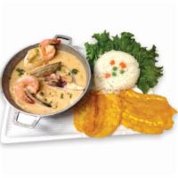 Cazuela de Mariscos  · Seafood casserole. It comes with salad, rice, fried green plantains or French fries.