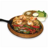 Fajitas Mixtas  · Grilled chicken, beef, shrimp with sauteed onions and peppers. It comes with beans, guacamol...