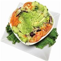 Ensalada de Aguacate / Avocado Salad · Lettuce, tomato.  grated carrot, cucumber slices and avocado and French dressing on the side.