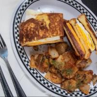 French Connection Sandwich · Triple Decker French Toast Sandwich. 2 Eggs & your Choice of Meat with American Cheese. 