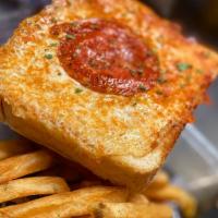 Pepperoni Pizza Grilled Cheese · Pepperoni, Melty Mozzarella, Tomato Sauce on Grilled Texas Toast with a Mozzarella Crust.