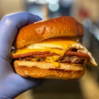 Brunch Burger · 2 Slices of Pork Roll, Fried Egg, Melty American on a Brioche Bun.