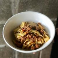 Pappardelle and Bolognese · Heartbrand grass-fed akaushi beef Bolognese, Parmigiano-Reggiano, and pappardelle.