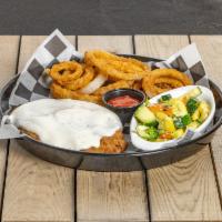 Country Fried Dinner · Your choice of chicken or steak! Enjoy the hand battered goodness either way, covered in our...