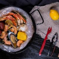Combo Special B · Served with 1 corn and 2 potatoes. 1/2 lb. crawfish, 1/2 lb. shrimp, and 1/2 lb. snow crab.