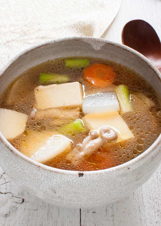 Yu Tofu Soup · Vegetable and tofu in clear broth.