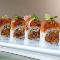Sexy Dragon Roll · Shrimp tempura inside spicy tuna on the top.