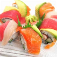 Rainbow Roll · Shrimp, white fish, yellowtail, tuna and salmon, wrapped around kani and avocado. 