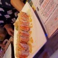 Christmas Roll · Spicy crunchy shrimp inside crab meat and crunchy on top.