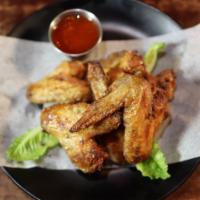 Chicken Wings (6) Pieces. · Marinated wings oven baked and lightly fried for extra crispiness. Your choice of Plain, Swe...