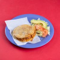 Gordita with Salad · Corn gordita stuffing with meat and salad on the side with cheese ,sour cream and avocado 
