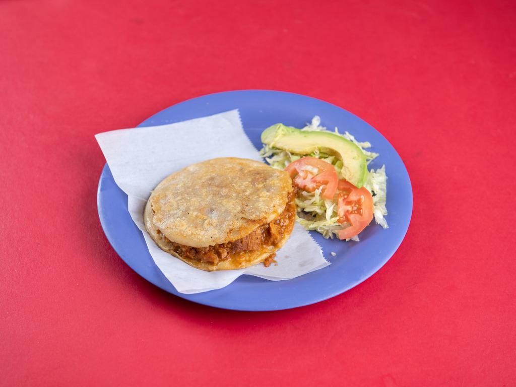 Gordita with Salad · Corn gordita stuffing with meat and salad on the side with cheese ,sour cream and avocado 