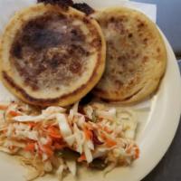 Pupusas · Salvadorian gorditas filled with pork and chees 