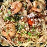 Crab & Shrimp Linguini · Lump crab, jumbo shrimp, fresh tomato, scallions, in a garlic lobster cream sauce