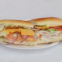 Turkey Club Sandwich · Ovengold turkey, beef, bacon, Swiss cheese, lettuce, tomato and Russian dressing.