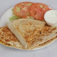 Chicken Quesadilla · Grilled chicken, cheddar cheese, mozzarella cheese, peppers and onions.