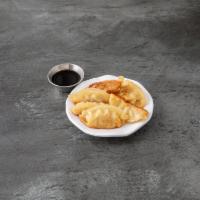12. Gyoza · Japanese pan fried pork dumplings.