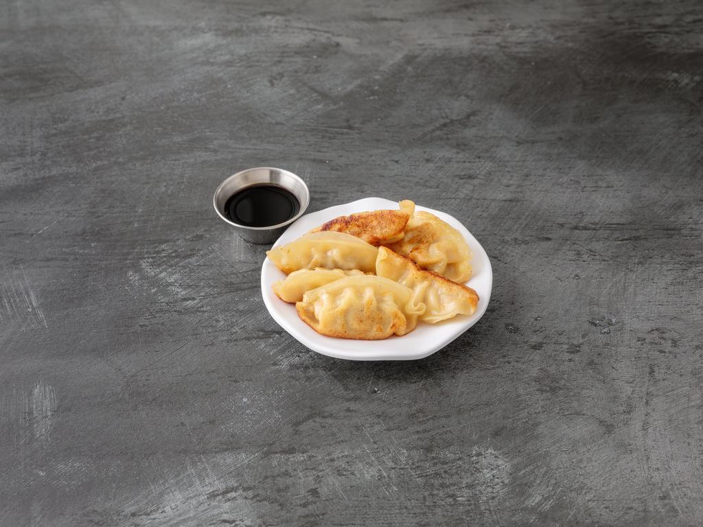 12. Gyoza · Japanese pan fried pork dumplings.