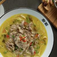 Golden Soup with Fatty Beef (酸辣金汤肥牛) · Pickling hot peppers creates the classic's more spicy-and-sour yellow cousin. Topped with fa...