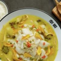 Golden Soup with Sliced Fish (酸辣金汤鱼) · Pickling hot peppers concentrates the flavors. This dish incorporates these peppers and is t...