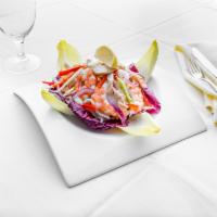 Italian Seafood Salad · Gulf shrimp, calamari, and scungili, in an extra virgin olive oil and fresh lemon dressing.
