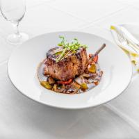 Double Cut 16oz. Pork Chop Giambotta · Over sauteed hot peppers, onions, and potatoes in a zesty sauce