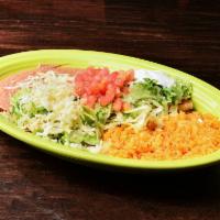 Burrito Mariachi · Stuffed with choice of beef or chicken cooked with bell pepper, tomato and onion. Topped wit...