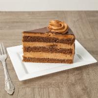 Chocolate Mousse Cake  · Chocolate Mousse Cake with 3 layers of moist chocolate cake and 2 layers of smooth & creamy ...